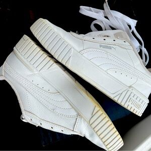 Size 2 (US) kids Puma sneakers, white. Worn twice.